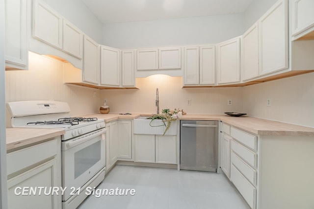 kitchen featuring dishwasher, white cabinetry, and white range with gas stovetop