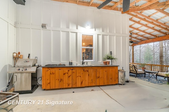 interior space featuring sink and grilling area