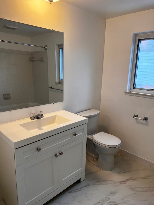 bathroom with toilet, marble finish floor, baseboards, walk in shower, and vanity