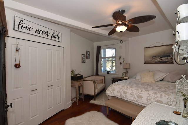 bedroom with ceiling fan, dark hardwood / wood-style floors, and a closet