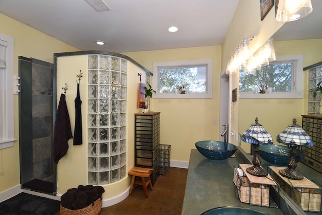 bathroom featuring vanity and walk in shower