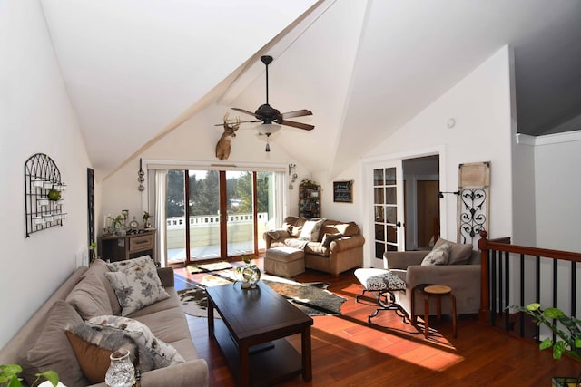 living room featuring ceiling fan, dark wood-type flooring, and lofted ceiling