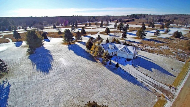 snowy aerial view with a rural view