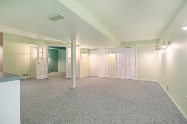 basement with carpet flooring