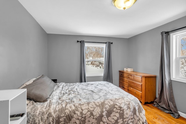 bedroom with light hardwood / wood-style flooring