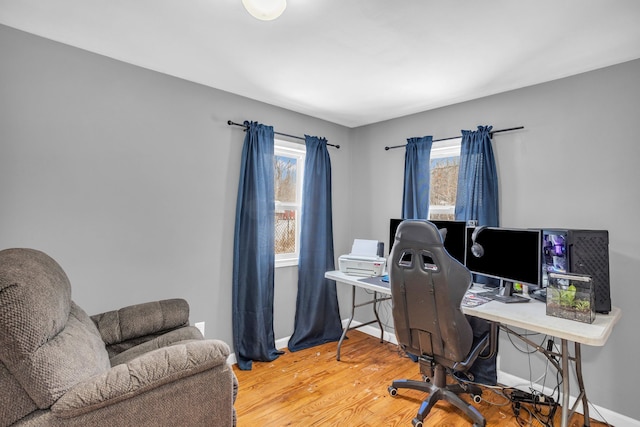 office area with hardwood / wood-style flooring