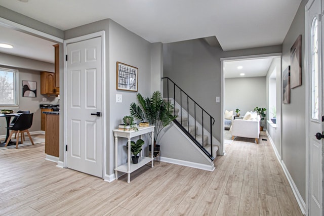 entrance foyer with light hardwood / wood-style floors