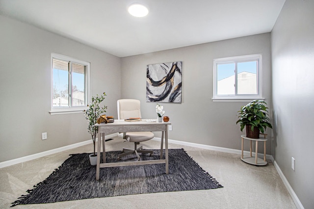 view of carpeted office space