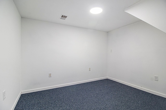 empty room with carpet flooring