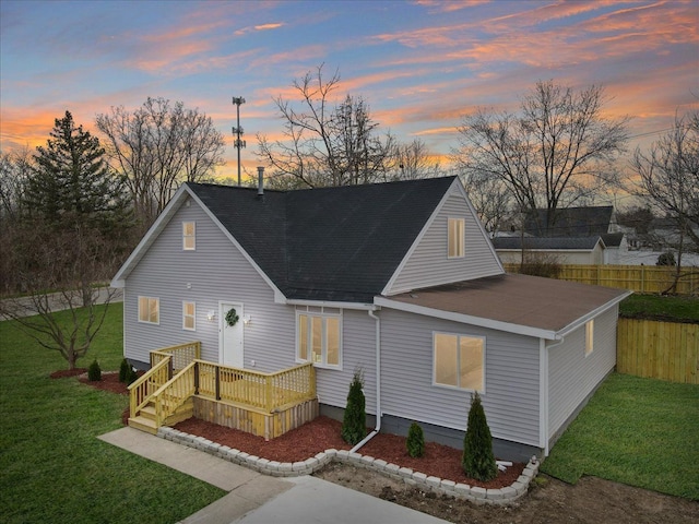 view of front of property with a yard