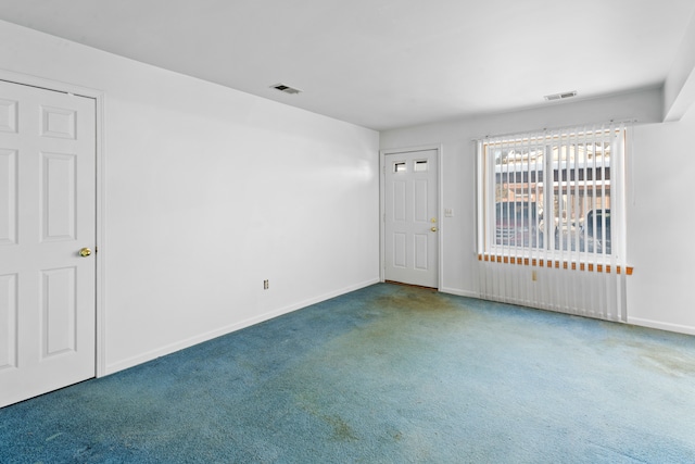 empty room featuring carpet