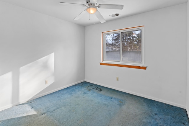 carpeted empty room with ceiling fan