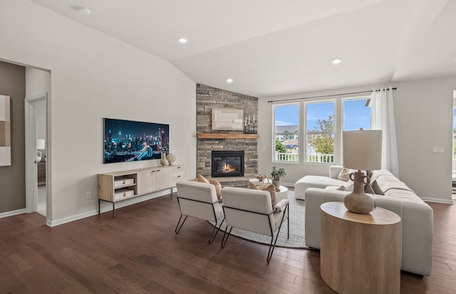 living room with a fireplace, dark wood-type flooring, and vaulted ceiling