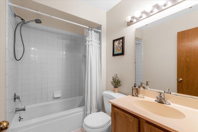 full bathroom featuring toilet, shower / bath combo with shower curtain, and vanity