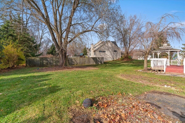 view of yard featuring a gazebo and a deck