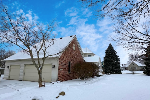 view of snow covered property