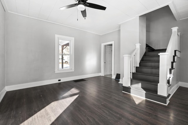 living room with crown molding, dark hardwood / wood-style floors, and ceiling fan