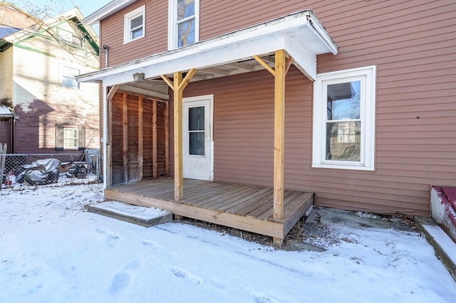 view of snow covered deck