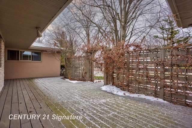 view of snow covered deck