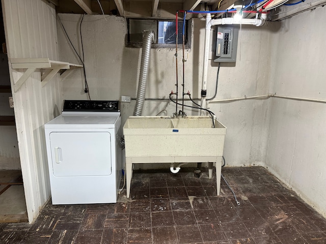 washroom featuring washer / clothes dryer, a sink, laundry area, electric panel, and tile patterned floors