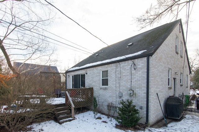 view of snow covered property