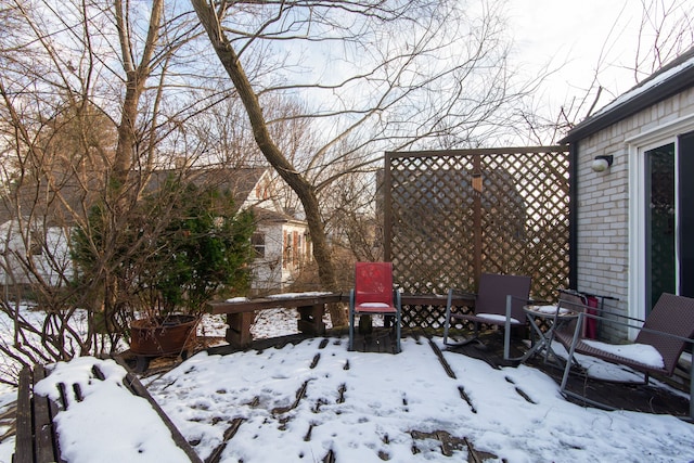 view of yard covered in snow