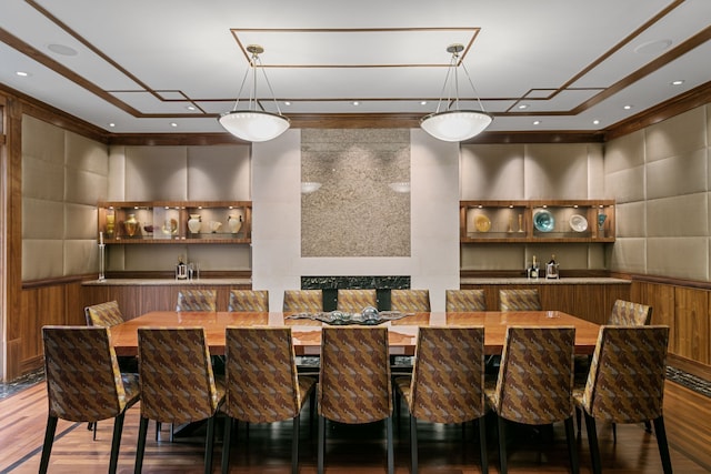 dining space featuring wood-type flooring