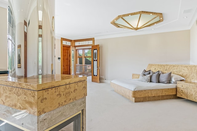 bedroom featuring carpet flooring and ornamental molding