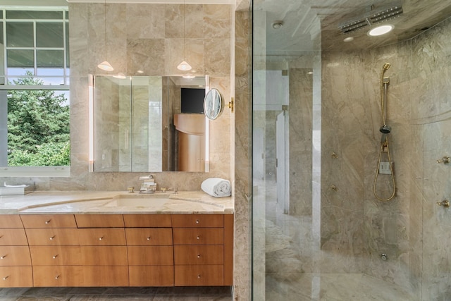 bathroom featuring vanity and walk in shower