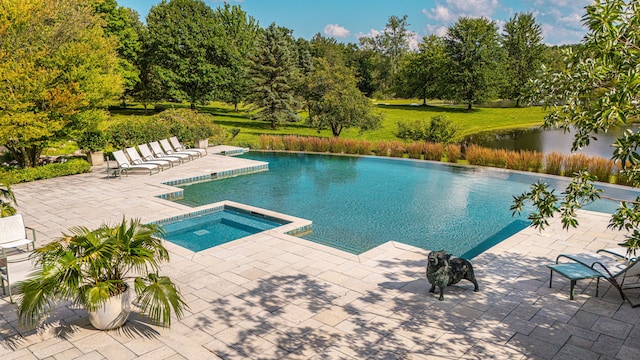 view of pool featuring a patio area, an in ground hot tub, and a water view