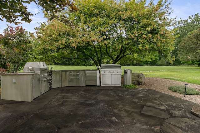 view of patio with a grill and area for grilling