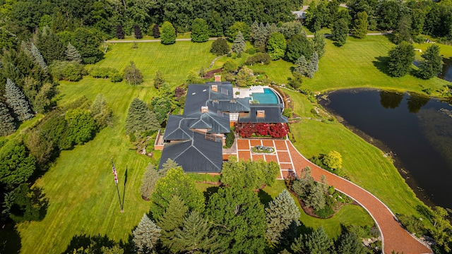 birds eye view of property featuring a water view