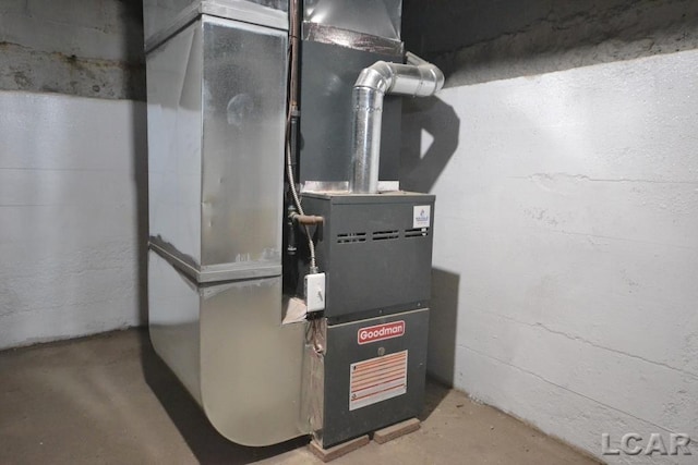 utility room with heating unit