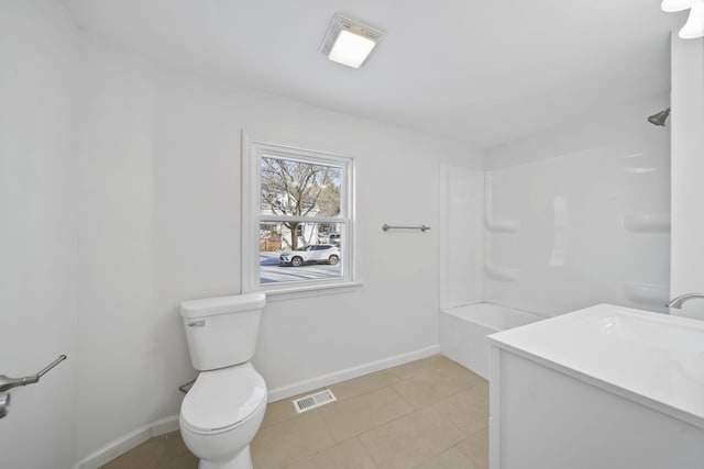 full bathroom with tile patterned flooring, vanity, toilet, and  shower combination