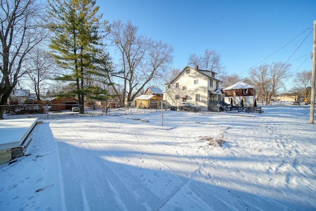 view of yard covered in snow