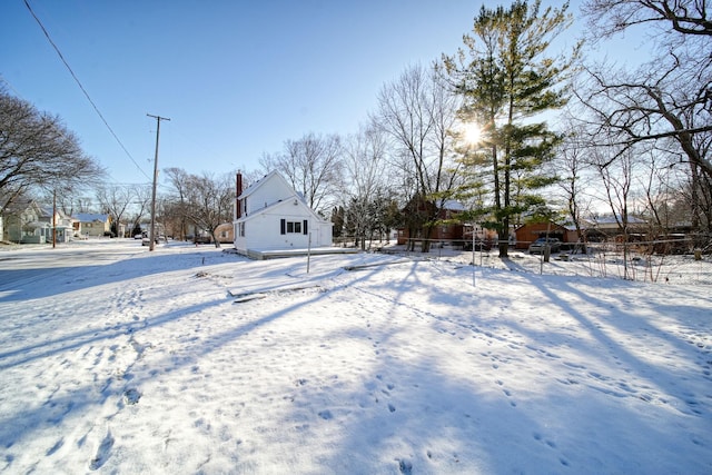 view of yard covered in snow