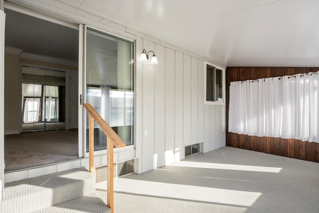 unfurnished sunroom with vaulted ceiling