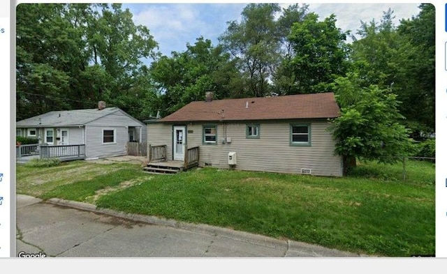 view of front of house with a front yard