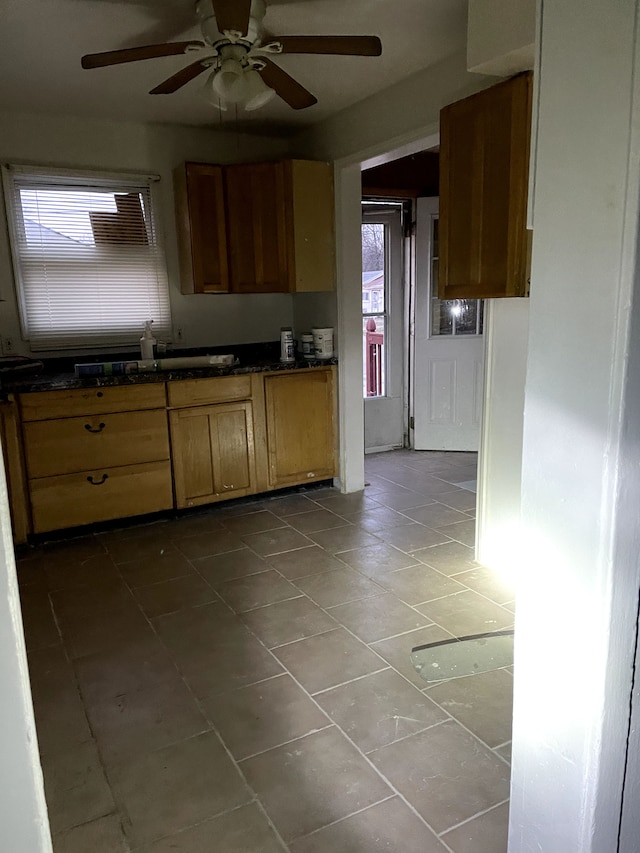 kitchen with ceiling fan and sink