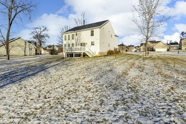 back of property with a deck