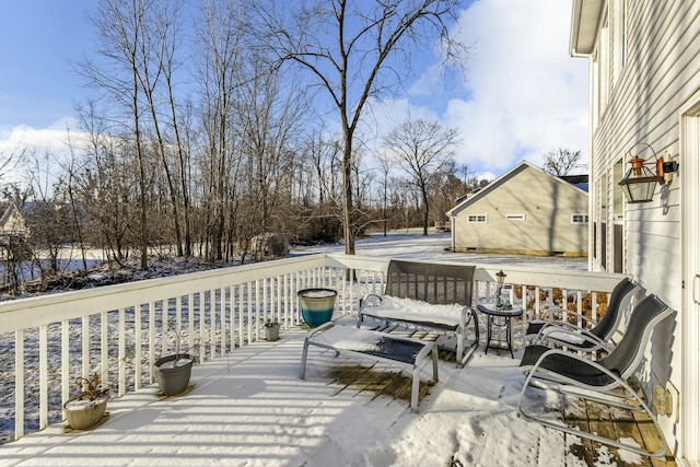 view of snow covered deck