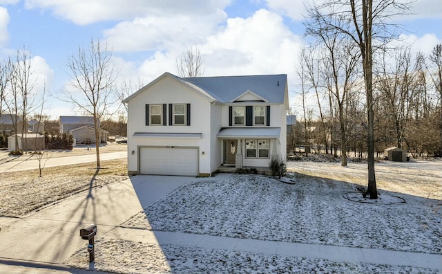 front of property with a garage