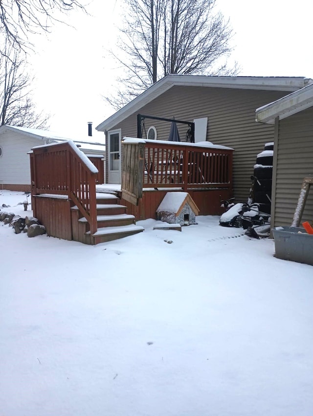 view of snow covered deck