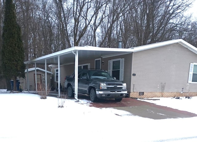 exterior space with a carport