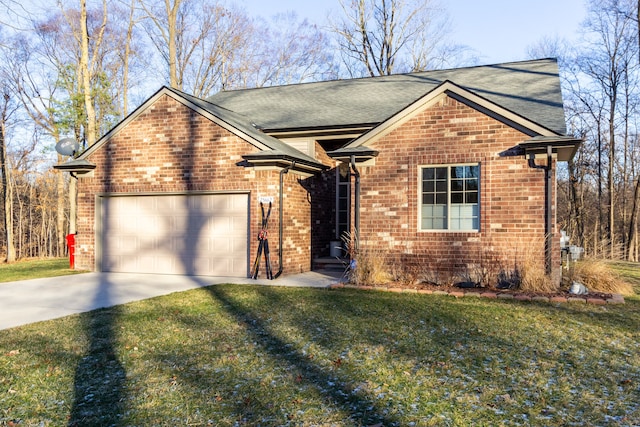 view of front property featuring a front lawn and a garage