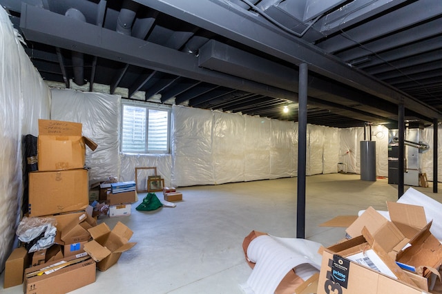 basement with heating unit and water heater