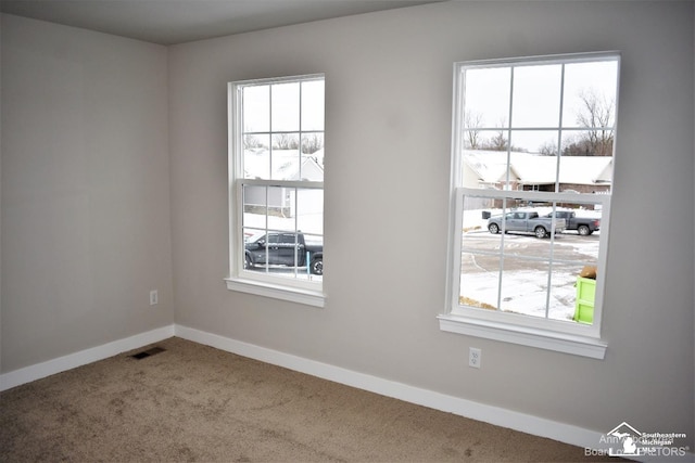 view of carpeted spare room