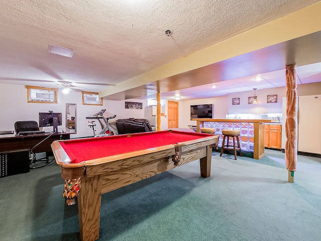 rec room with pool table, bar area, and carpet flooring