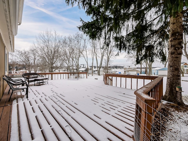 view of snow covered deck