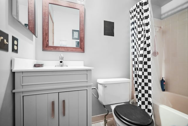 full bathroom featuring vanity, toilet, and shower / tub combo